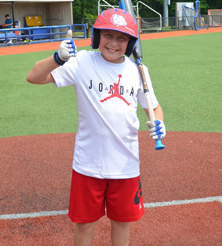 boy happy after baseball game