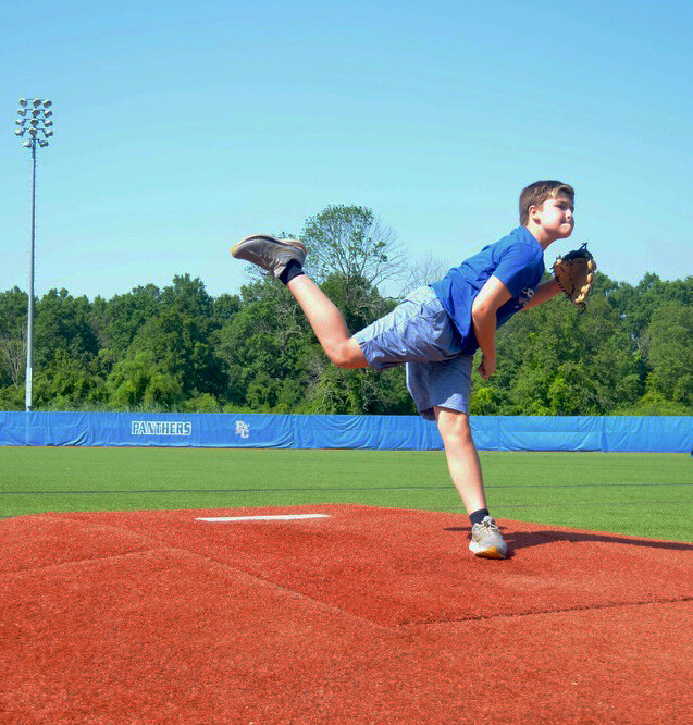 boy playing baseball