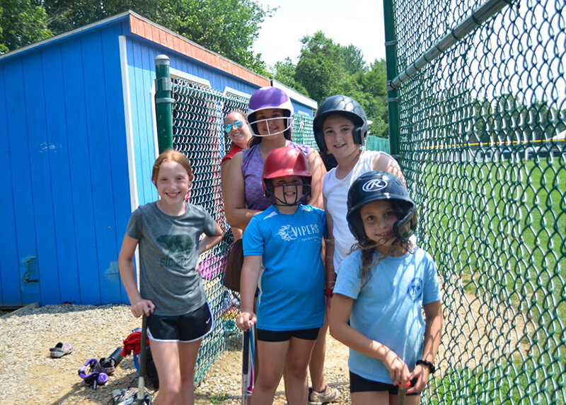 girls enjoying softballcamp