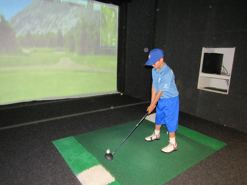 golf practice at summer camp