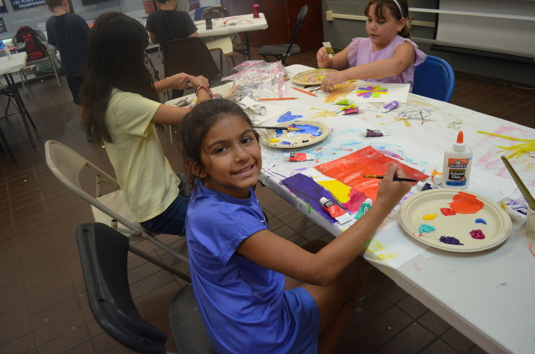 kids painting at art camp